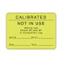 Lab Communication Label (Paper, Permanent) Calibrated Not In  2 3/8"x1 3/4" Fluorescent Yellow - 1000 per Roll